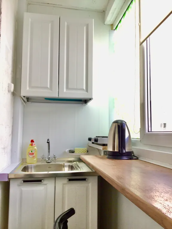 Студия с кухней в центре