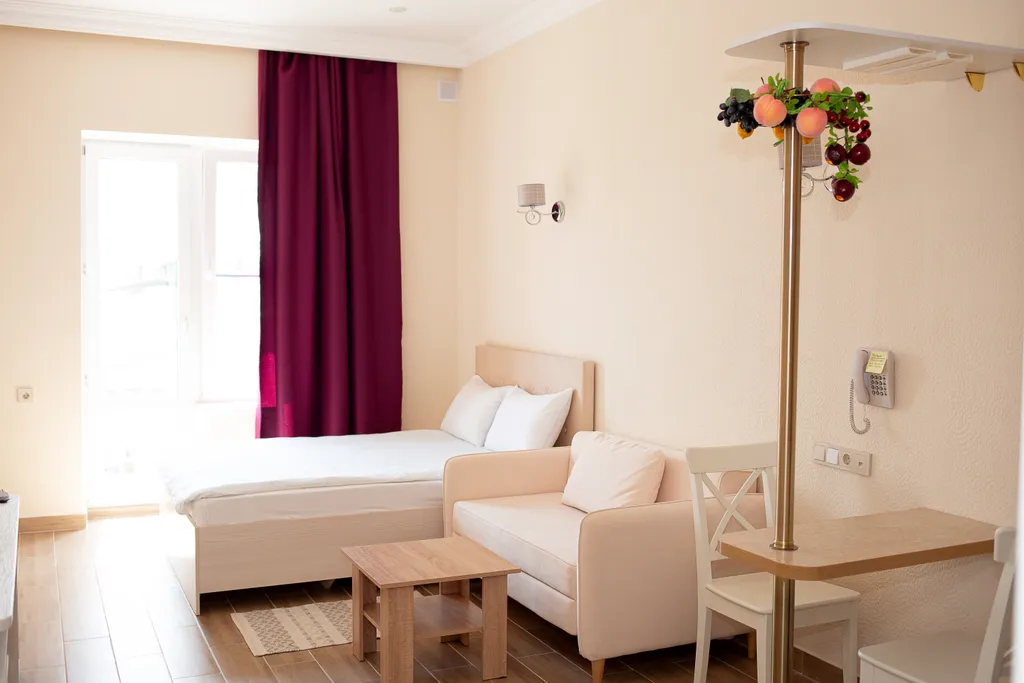 Превосходный двухкомнатный семейный номер с мини кухней