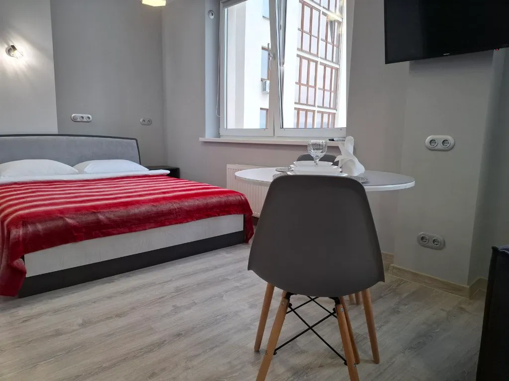 Квартира Яркая студия в центре Минска рядом с парком — Минск