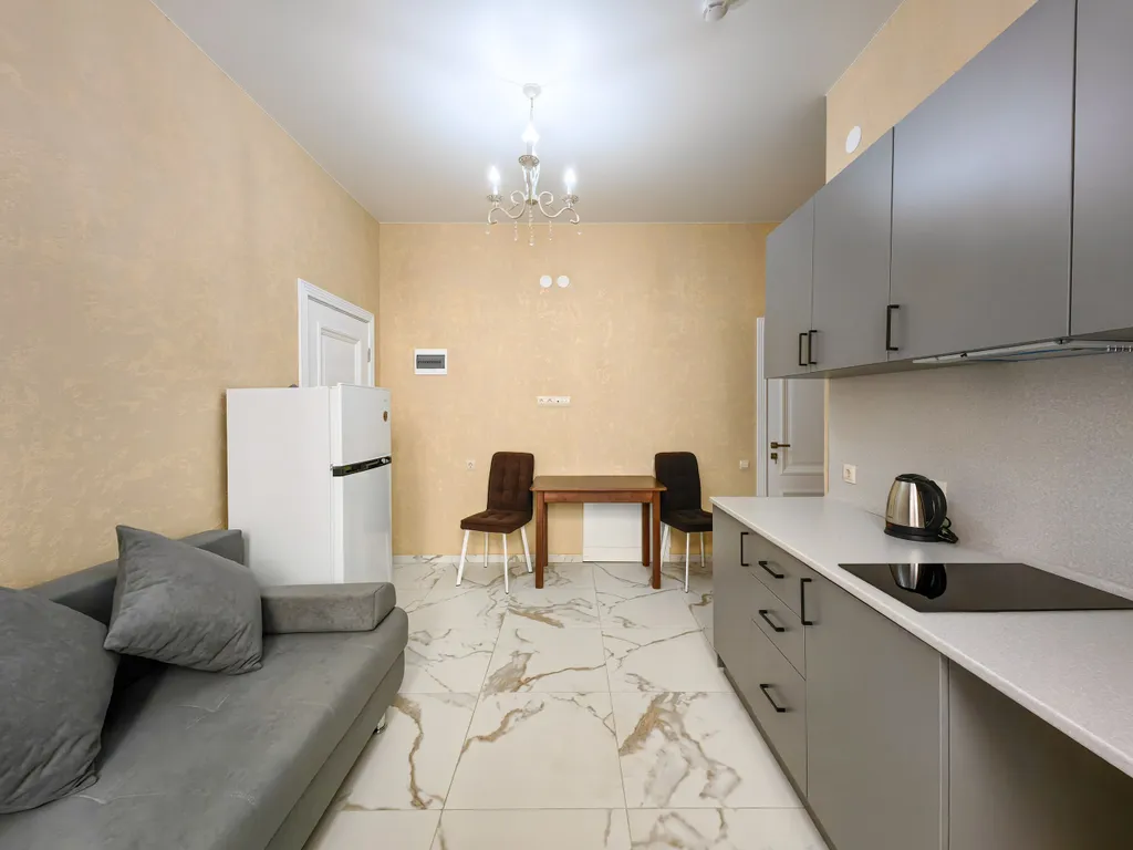 Апартаменты с отдельной спальней и кухней - гостиной