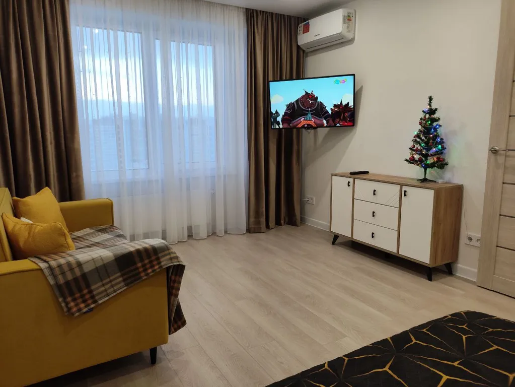 1-комнатная квартира с обзорным видом на город и лес