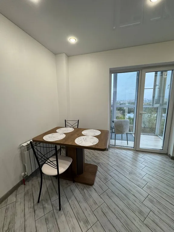 Уютная квартира с панорамными окнами и шикарным видом на город