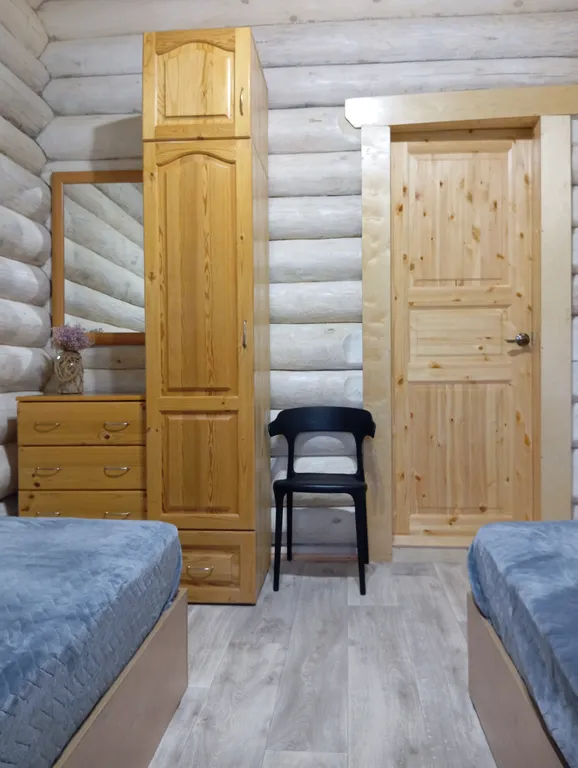 Меличуярви дом из бревна с сауной на берегу озера у самого леса