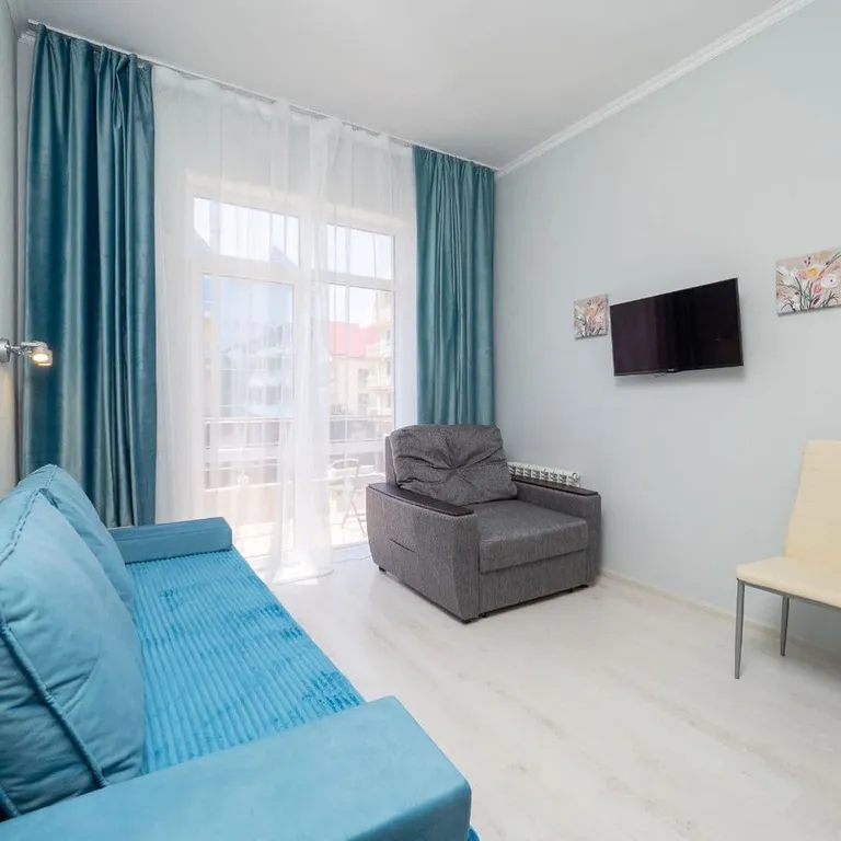 Квартира Квартира Уютная студия у моря с теплым бассейном — Сириус