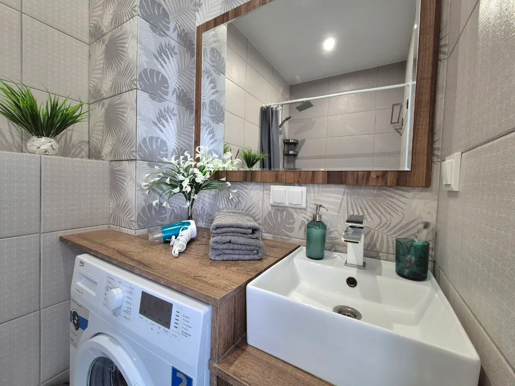 Уютная квартира Diamond в новом доме в центре города.