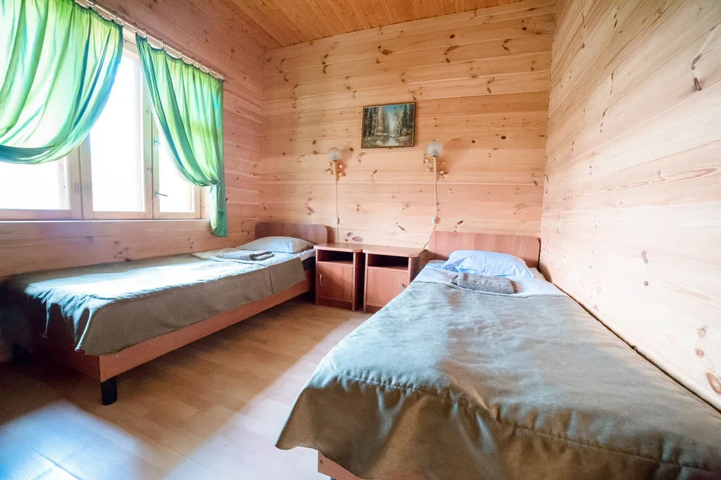 Семейный коттедж с сауной, на тихом берегу озера Воукса