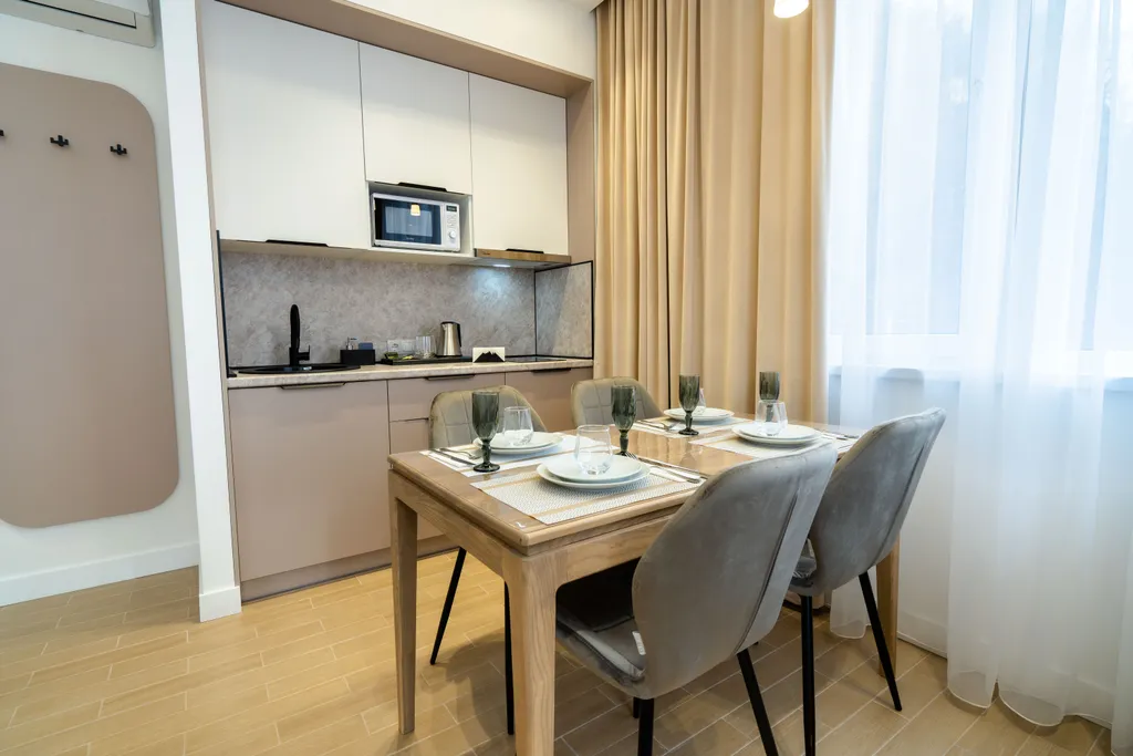 Семейный номер с видом на горы и кухонной зоной