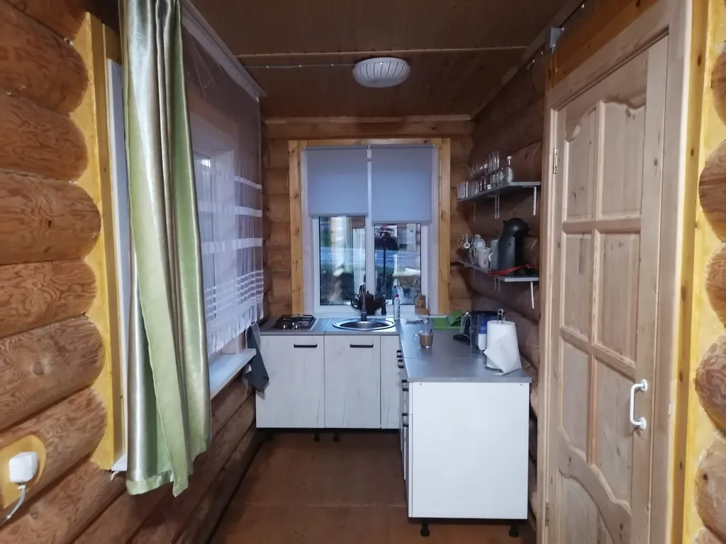 Новый бревенчатый дом в центре