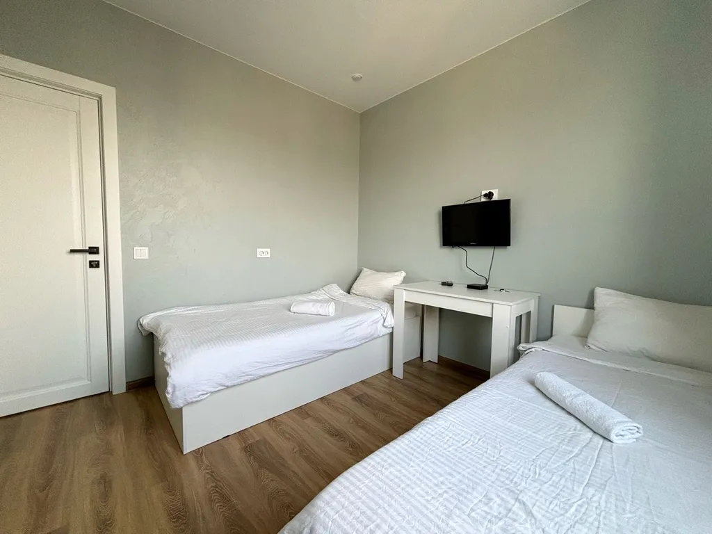 Двухместный номер с раздельными кроватями и шикарным видом на горы