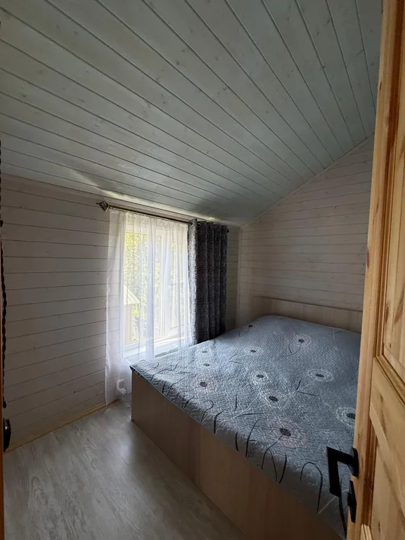 Двухэтажный коттедж с видом на лес