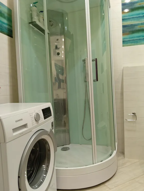 Видовая квартира с дизайнерским ремонтом у Дворца игровых видов спорта