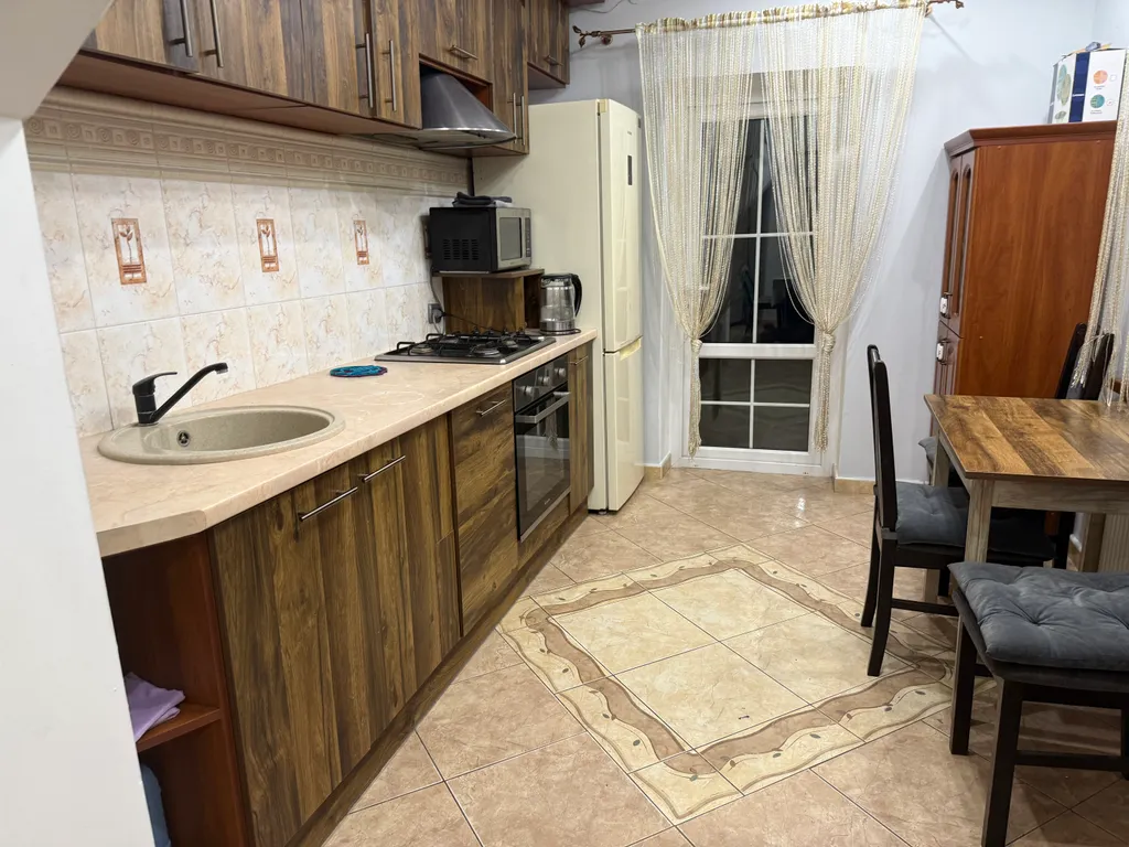 Уютный коттедж в черте города