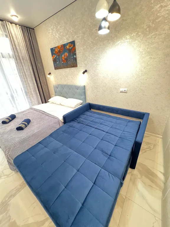 Уютная студия с балконом