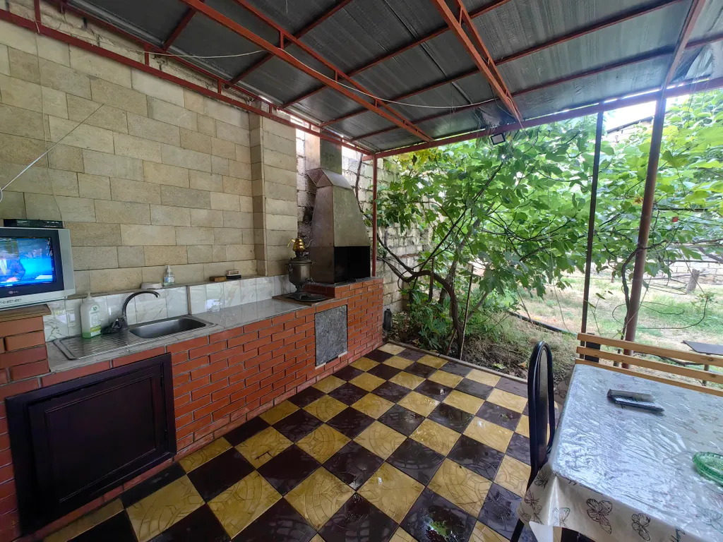 Просторный дом с зоной барбекю