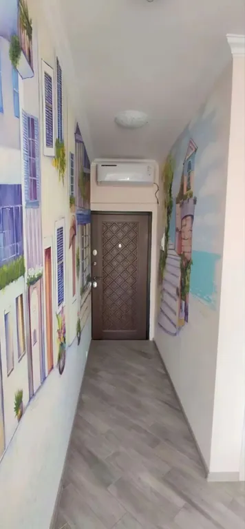 Апартаменты с видом на море, расписными стена и отдельной спальней