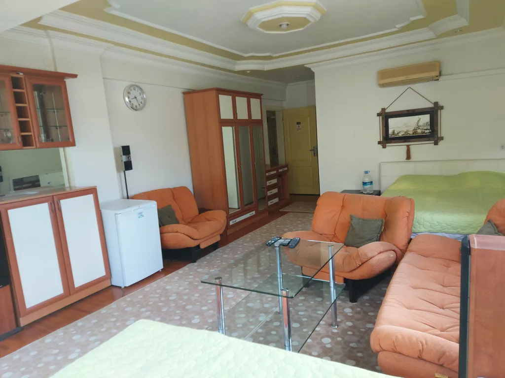 Апартаменты с кухней и ванной в номере в Бельдиби