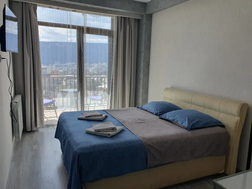 Уютная квартира с видом на горы и город