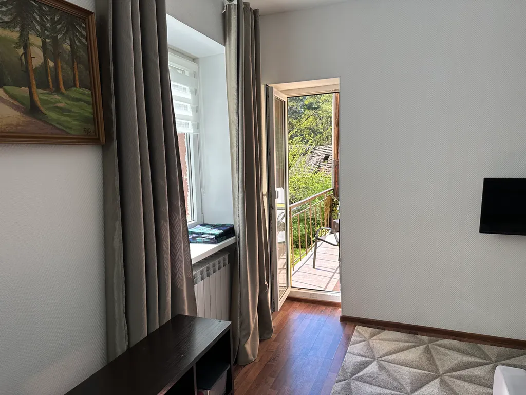 Апартамент в окружении сосен и видом на кирху