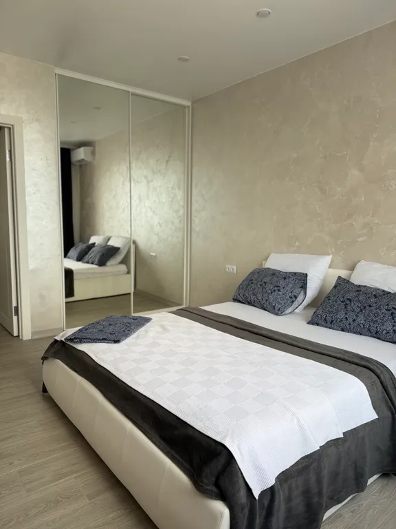 Уютная светлая квартира с видом на город