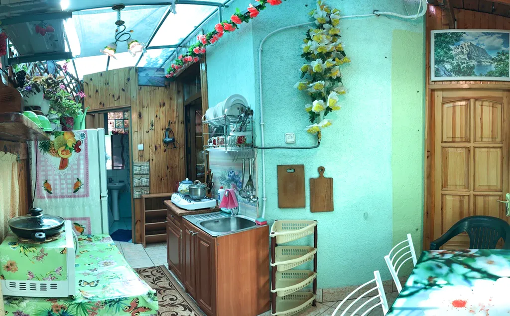 Уютная квартира с летней верандой-кухней