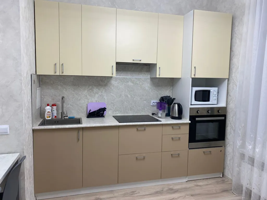 Уютная квартира в новом доме в 10 минутах от центра города