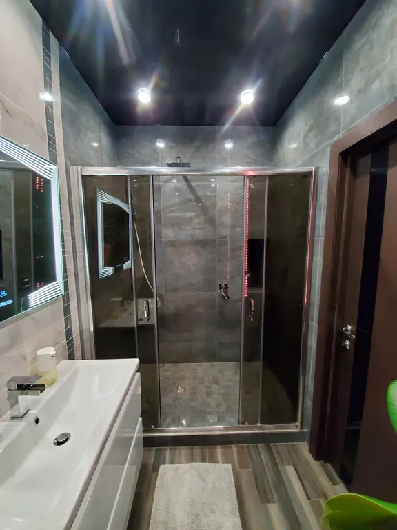 Видовые апартаменты в стиле лофт с умным домом