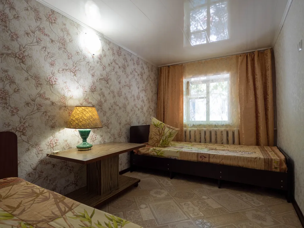 Уютный домик в беседках винограда