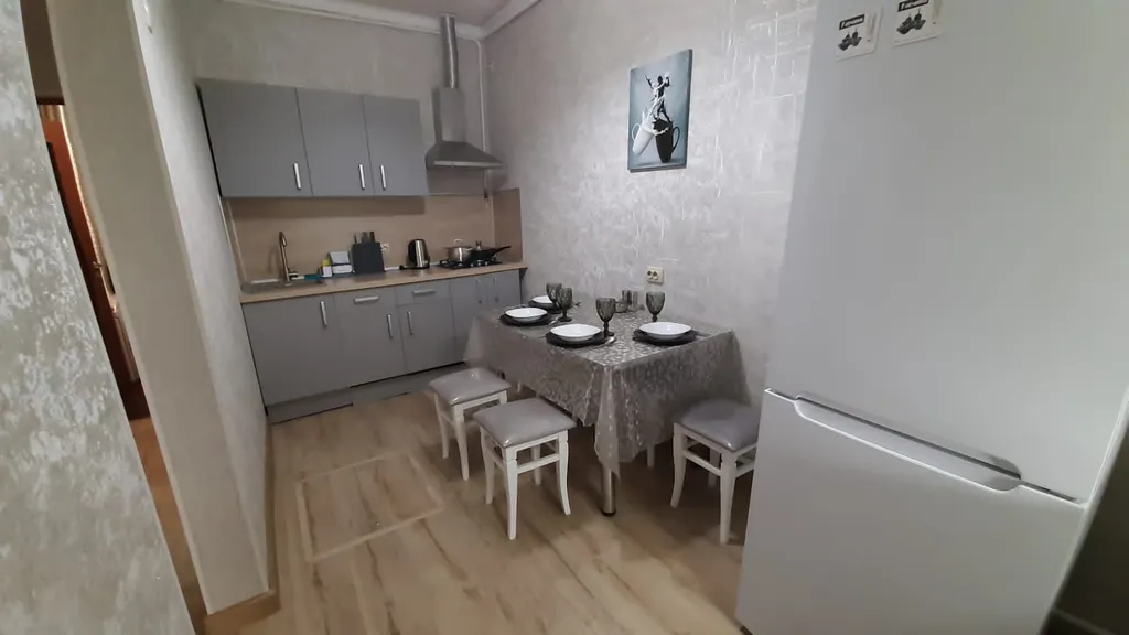 Уютный дом в центре города с местом для парковки автомобиля