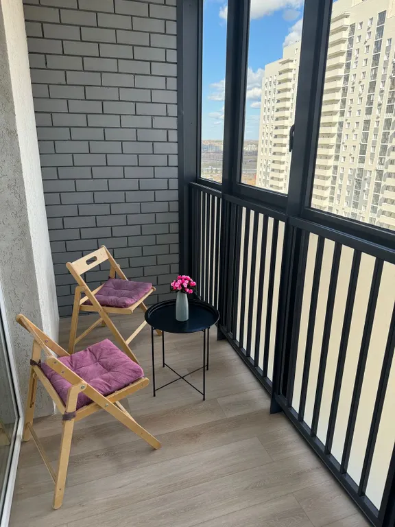 Уютная студия с видом на город