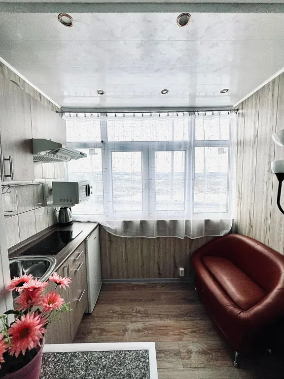 Квартира Уютная студия с односпальной кроватью, кухней и видом на город — аренда посуточно в Мурманск