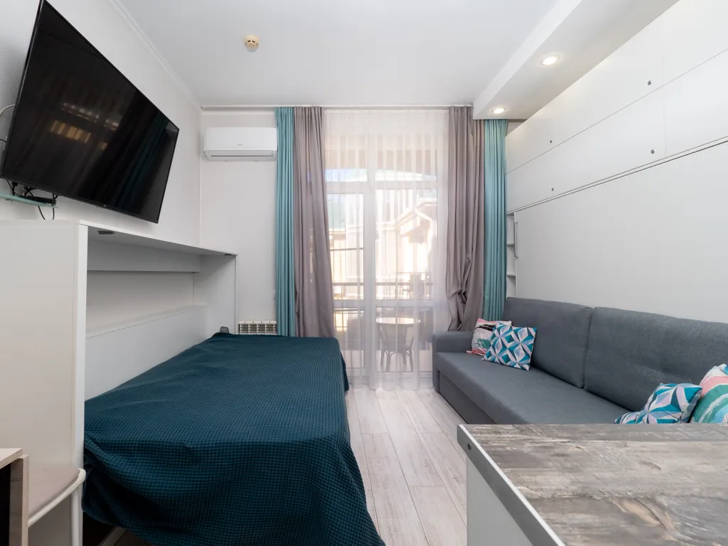 Квартира Квартира Светлая студия у моря с теплым бассейном — Сириус