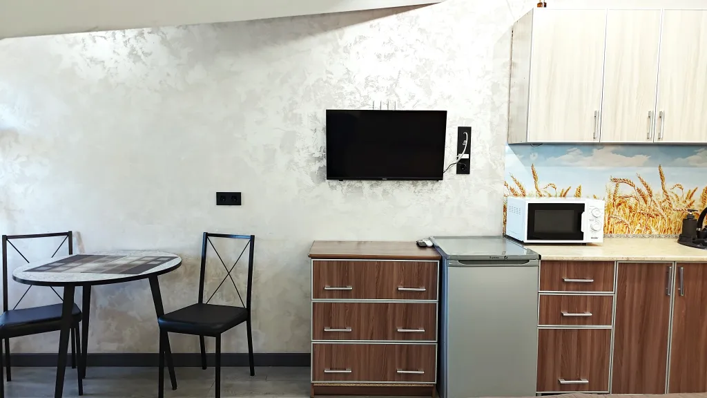 Уютная студия с балконом и красивым видом на горы