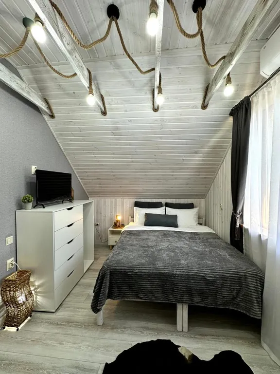 Монсардный этаж в стиле шале