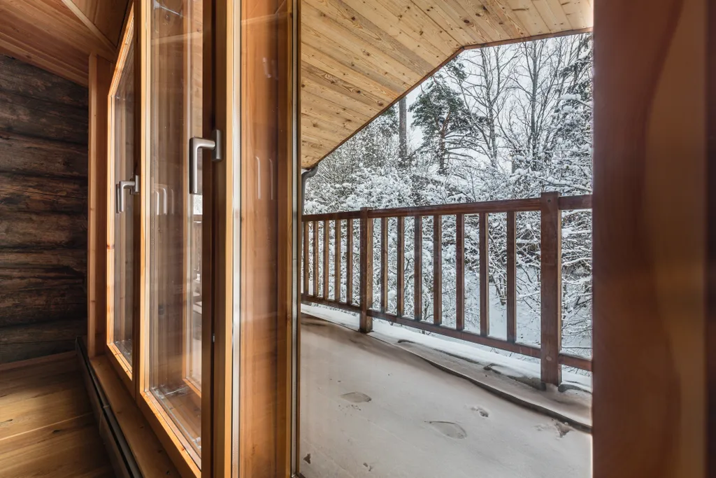 Дом из бревна kelo