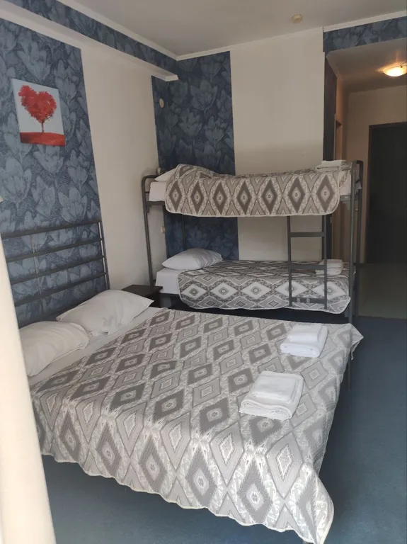 Номер на пятом этаже с видом на горы