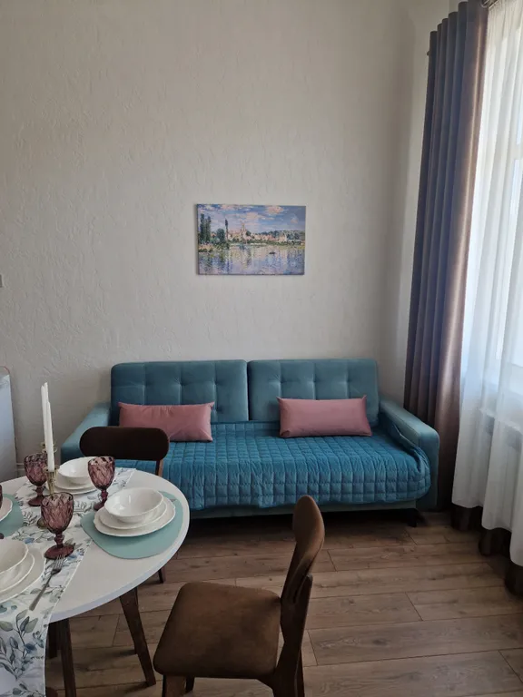 Уютная двухуровневая студия в центре