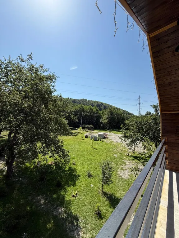 Двухэтажный коттедж с видом на лес