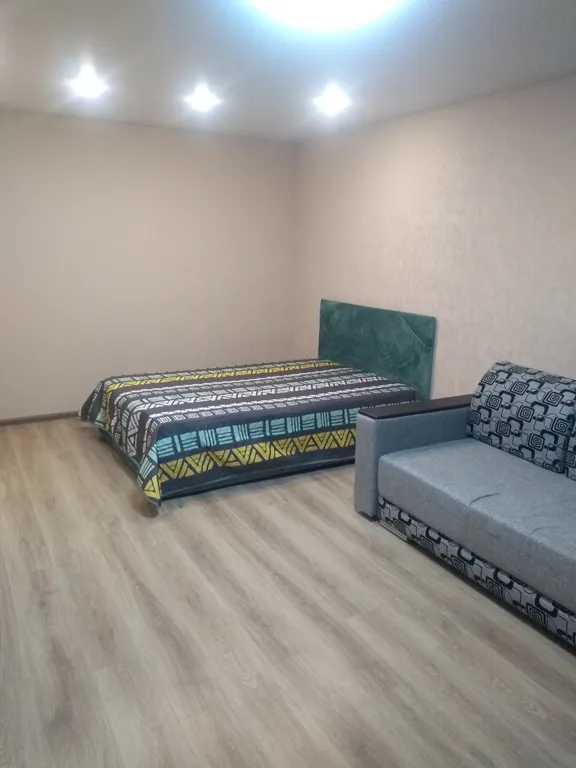 Уютная квартира в центре города с кондиционером и видом на памятник Победы