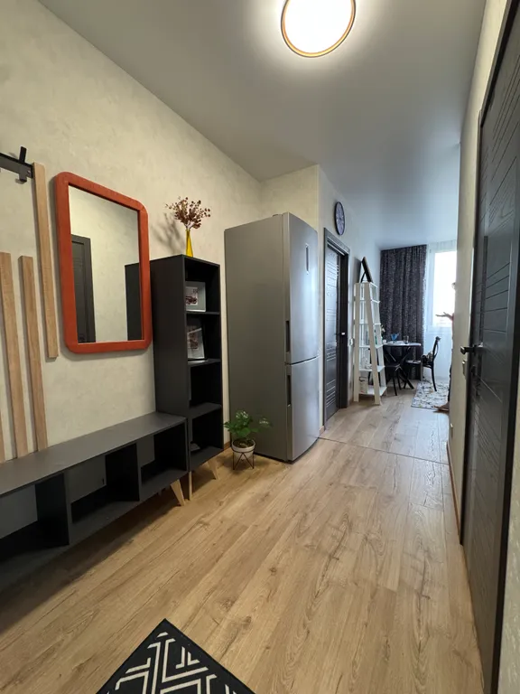 Квартира с большой кухней-гостиной и уютной изолированной спальней