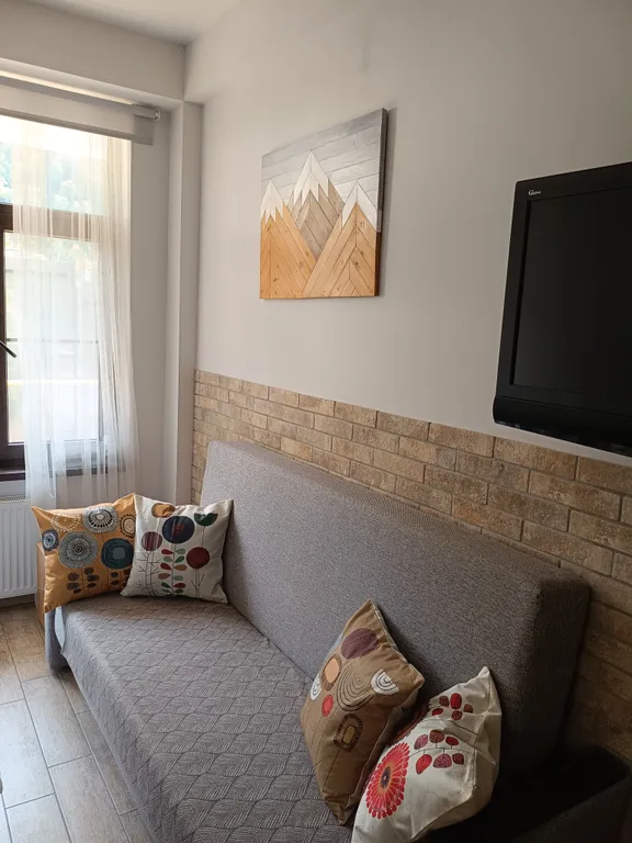 Уютная студия на Плотинной