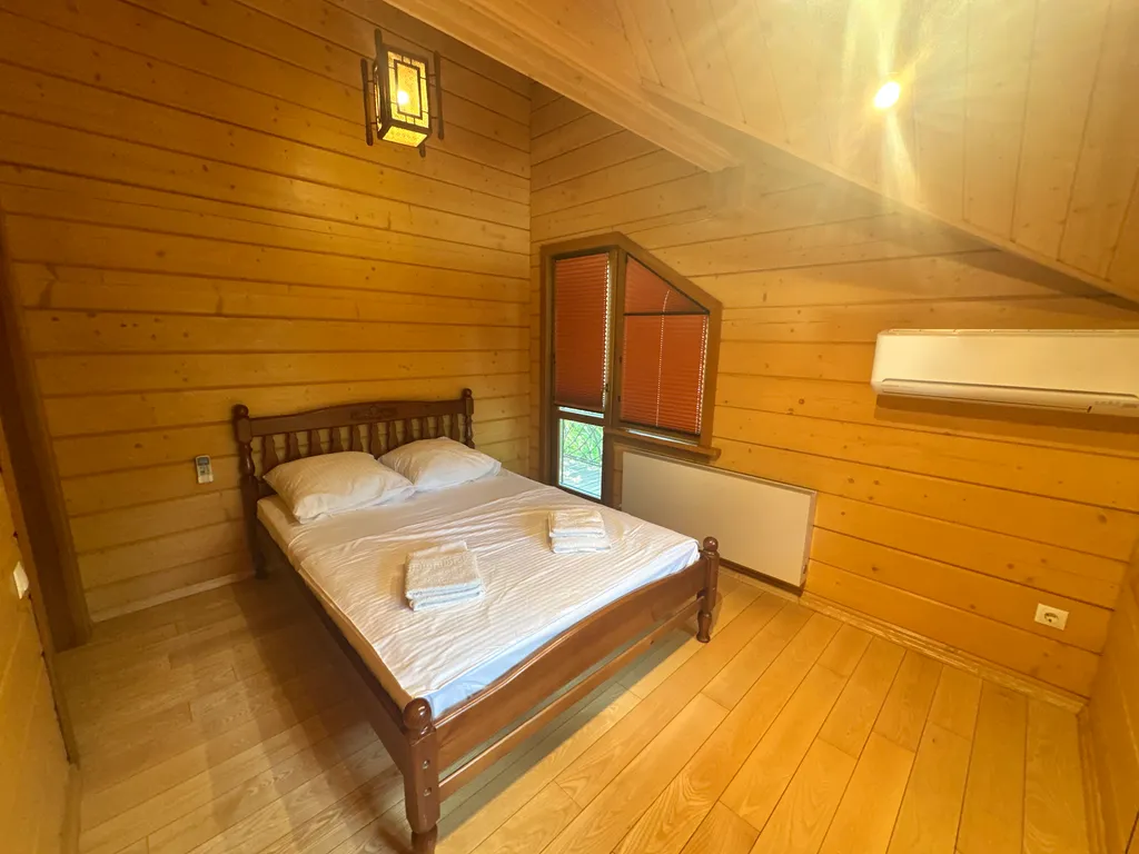 Деревянный дом с приватной территорией