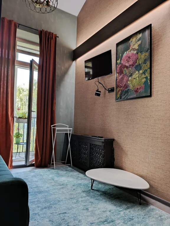 Атмосферная двухуровневая квартира с видом на Петропавловский парк