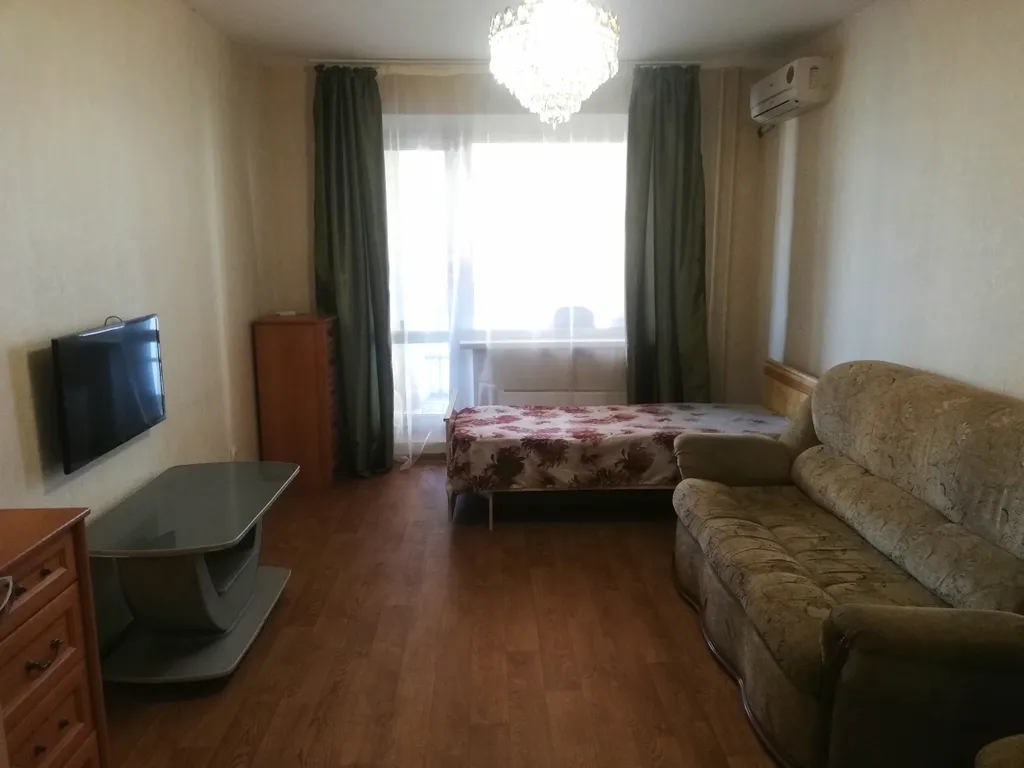 Квартира с видом на парк и Волгу