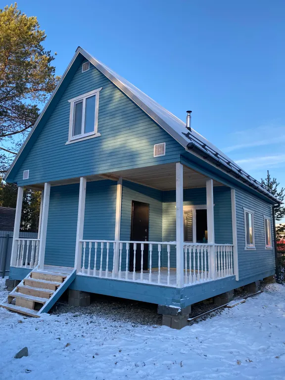 Уютный дом у леса и озера