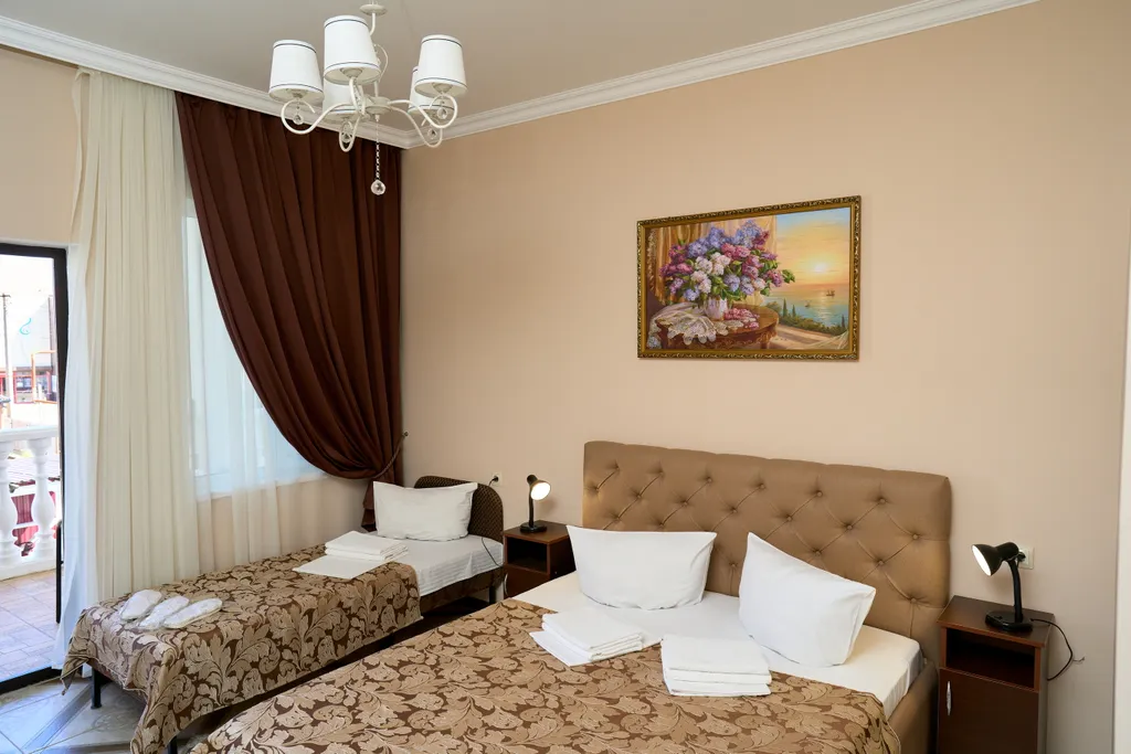 Квартира Квартира Трёхместный номер комфортный с 1 двуспальной кроватью и 1 односпальной — Кучугуры