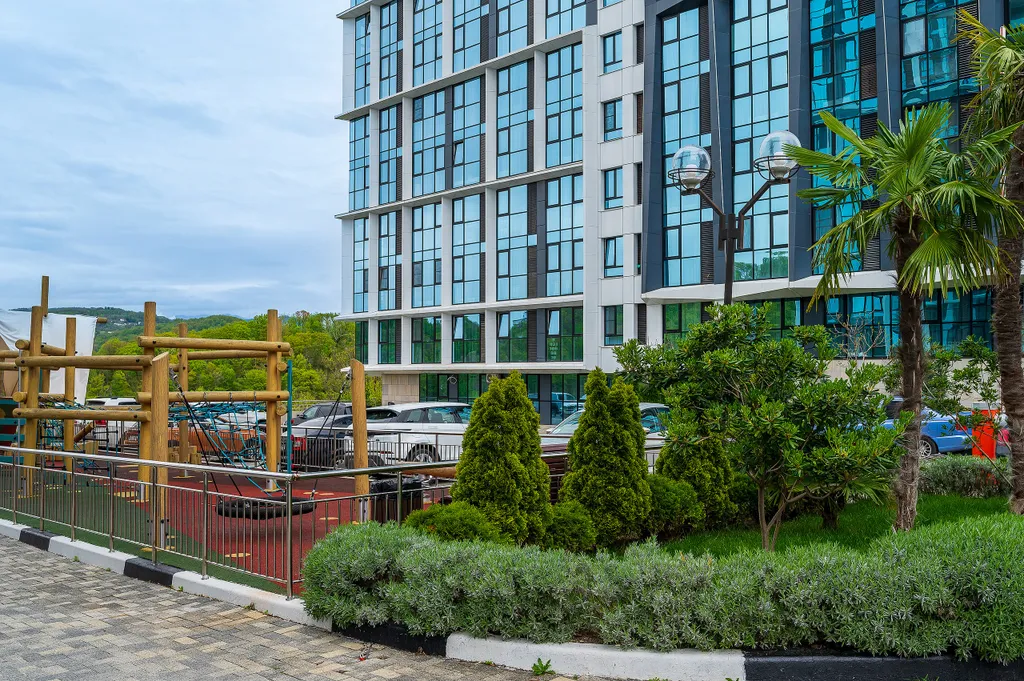 Светлая студия Real Apartments