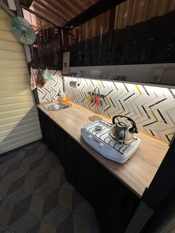 Уютный домик с балконом и террасой