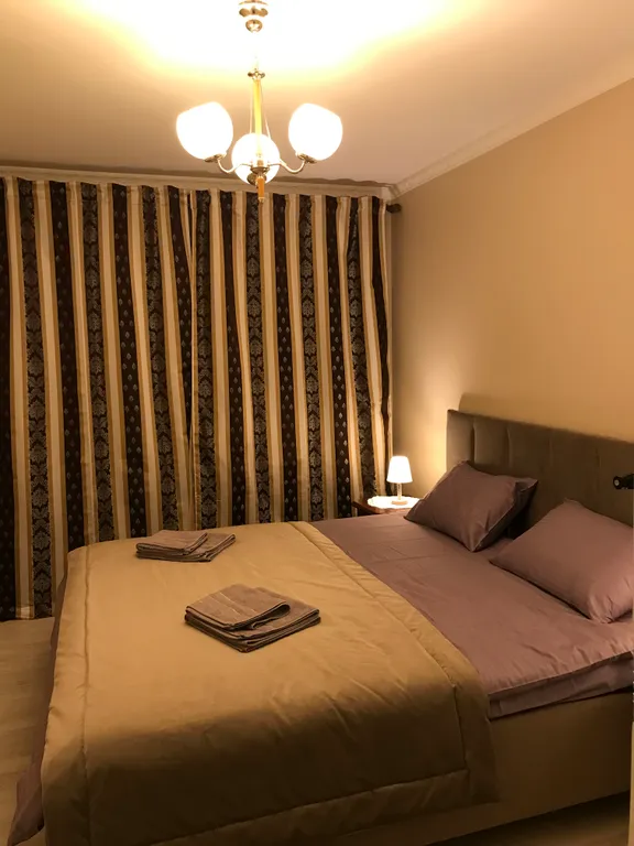 Квартира с зелёной гостиной