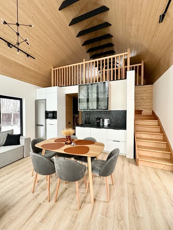 Новый панорамный барнхаус с сауной на лесном участке