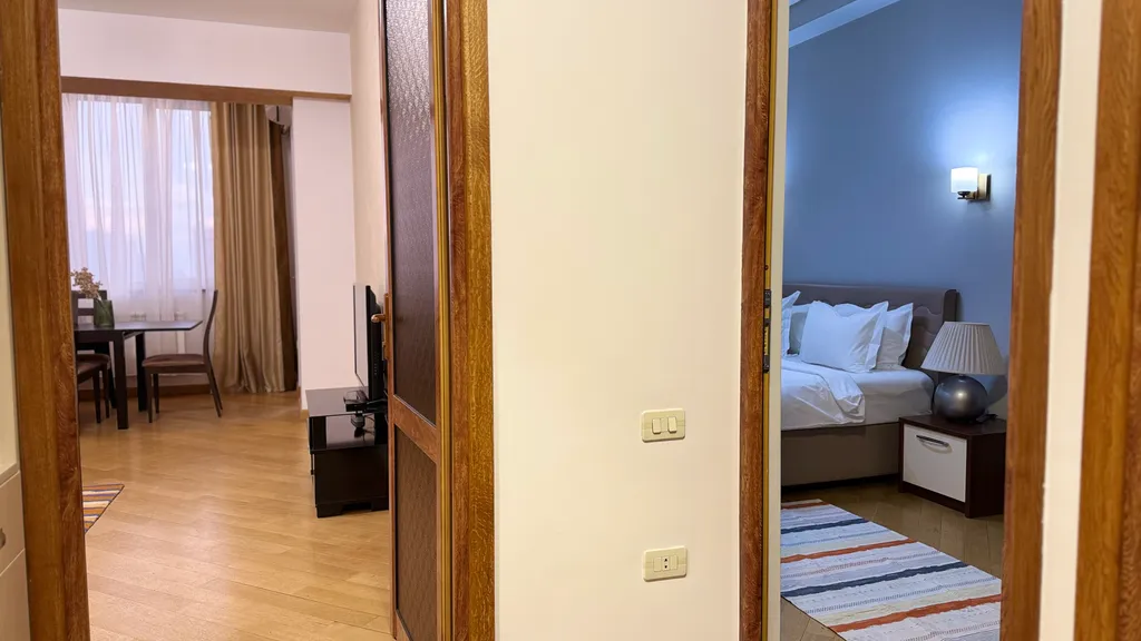 Улучшенные апартаменты с 1 спальней и  балконом в центре города